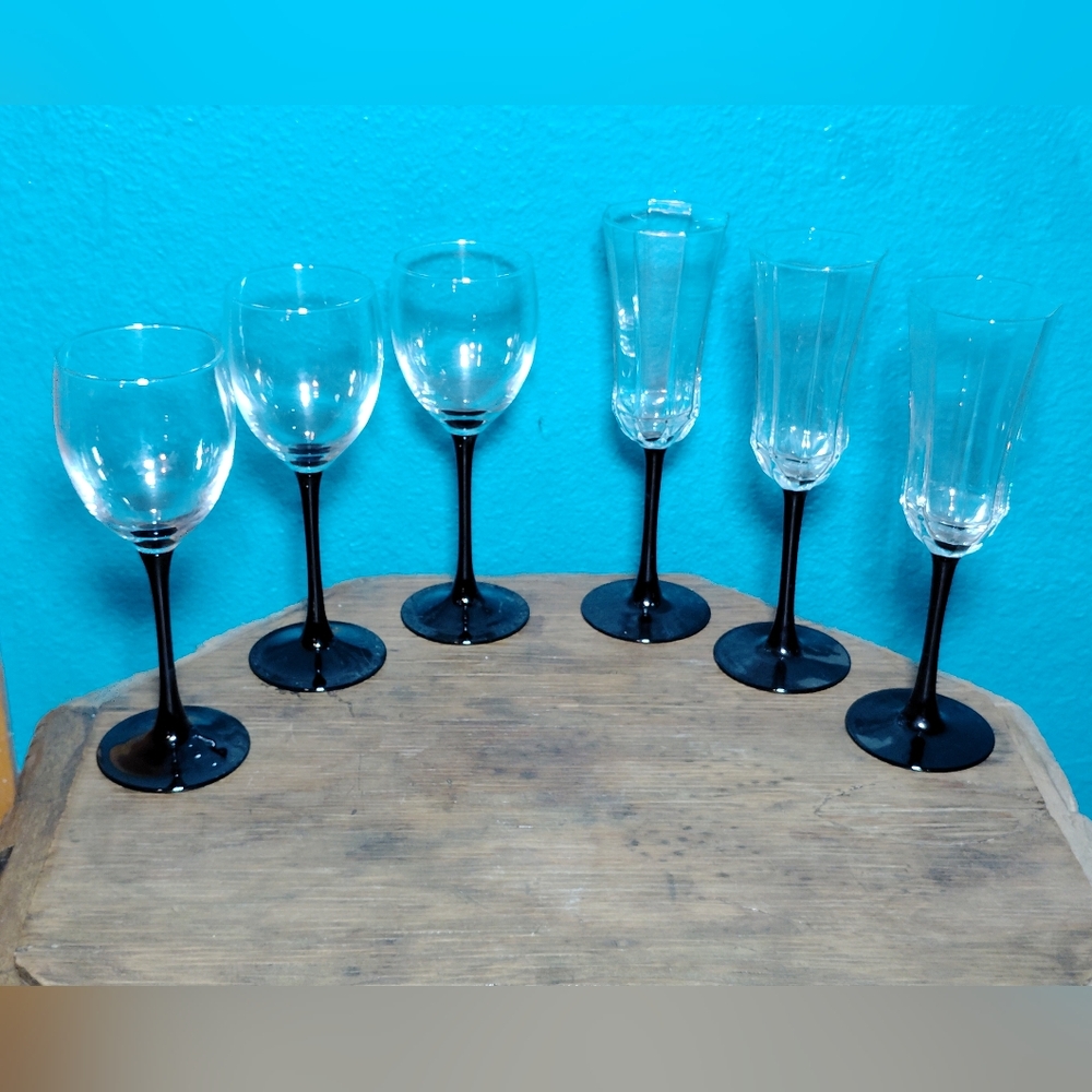 3 octime flutes and 3 black stemmed